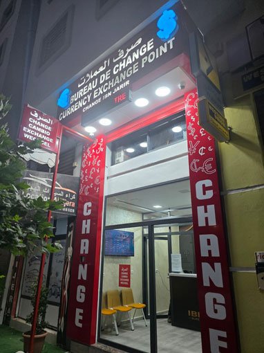 Enseigne extérieure du Bureau de Change IBN JARIR à Deroua Résidence Al Madina, à 5 minutes de Nouaceur.